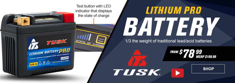 Tusk Lithium Pro Battery, 1/3 the weight of traditional lead/acid batteries, From $78 and 99 cents, MSRP $109 and 99 cents, video available, the battery along with a shot of the test button on the top, call-out, test button with LED indicator that displays the state of charge, link, shop