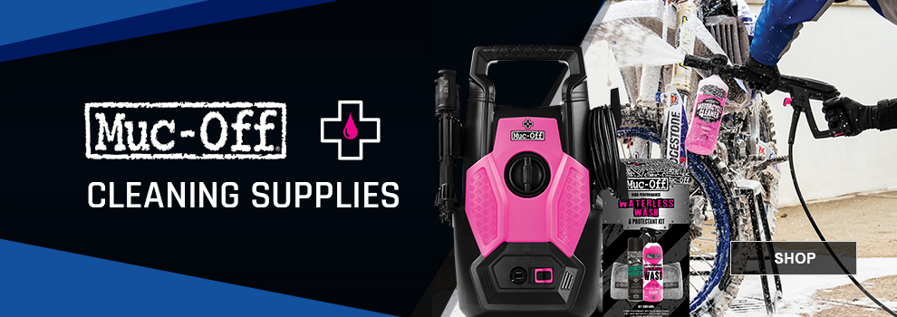 Muc-Off Cleaning Supplies, the black and pink power washer along with a shot of someone using the foam gun on a dirt bike in the background, link, shop