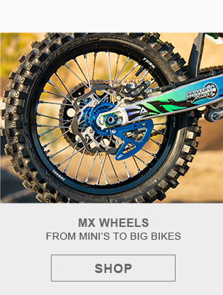 MX wheels, from minis to big bikes. Link, shop. Back wheel installed on a bike. 