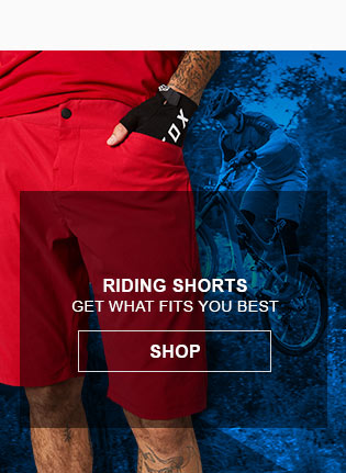 Riding shorts, get what fits you best. Link, shop. Man wearing MTB riding shorts and another riding a mountain bike.