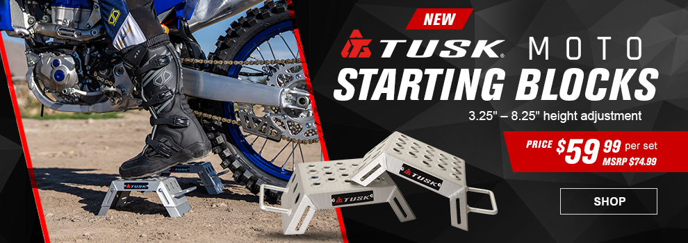New Tusk Moto Starting Blocks, 3.25 inch to 8.25 inch height adjustment, Price $59 and 99 cents per set, MSRP $74 and 99 cents, a shot of the starting blocks along with a shot of someone sitting on a dirt bike using the blocks at a motocross track, link, shop