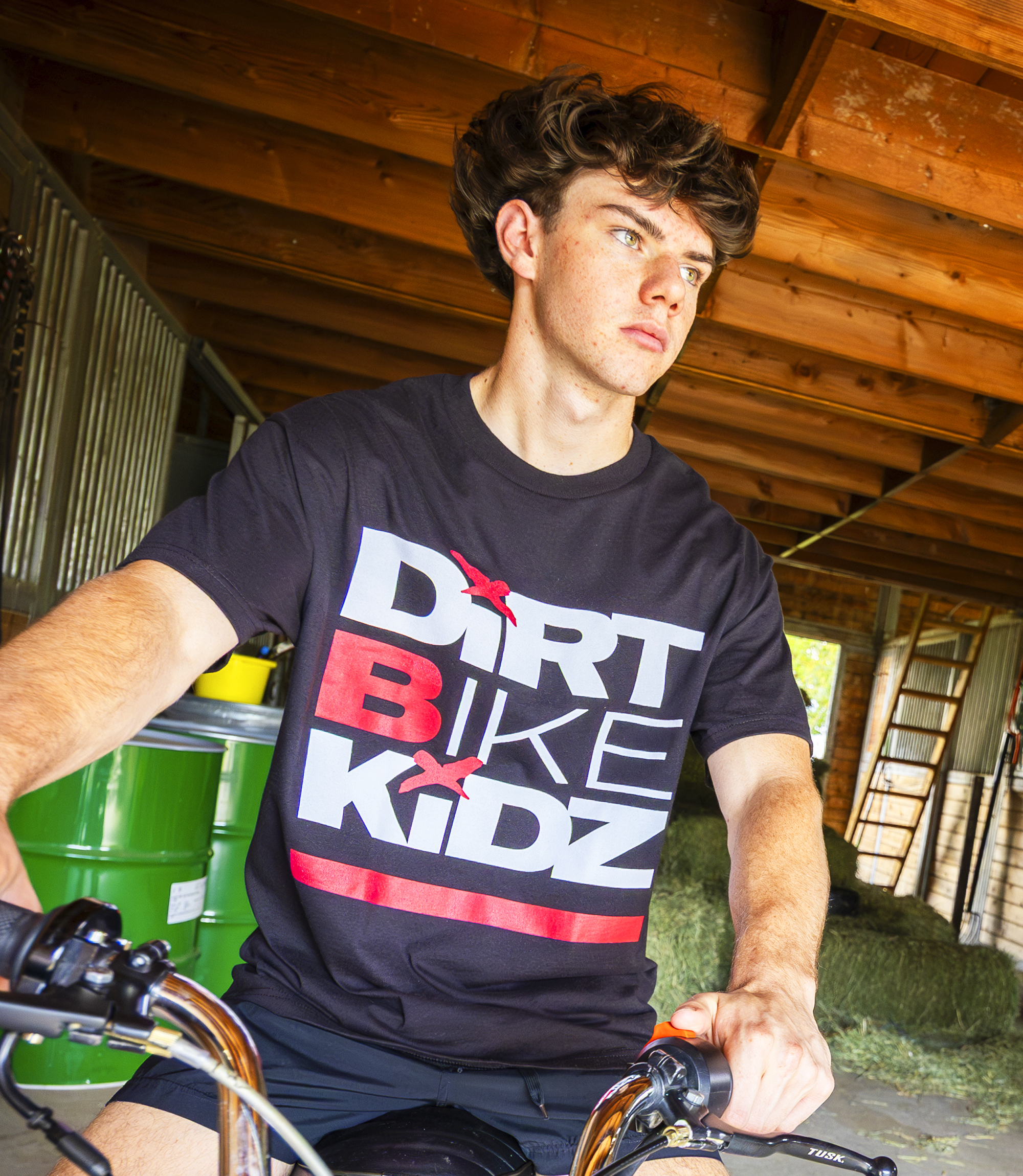 Man wearing Dirt Bike Kids shirt