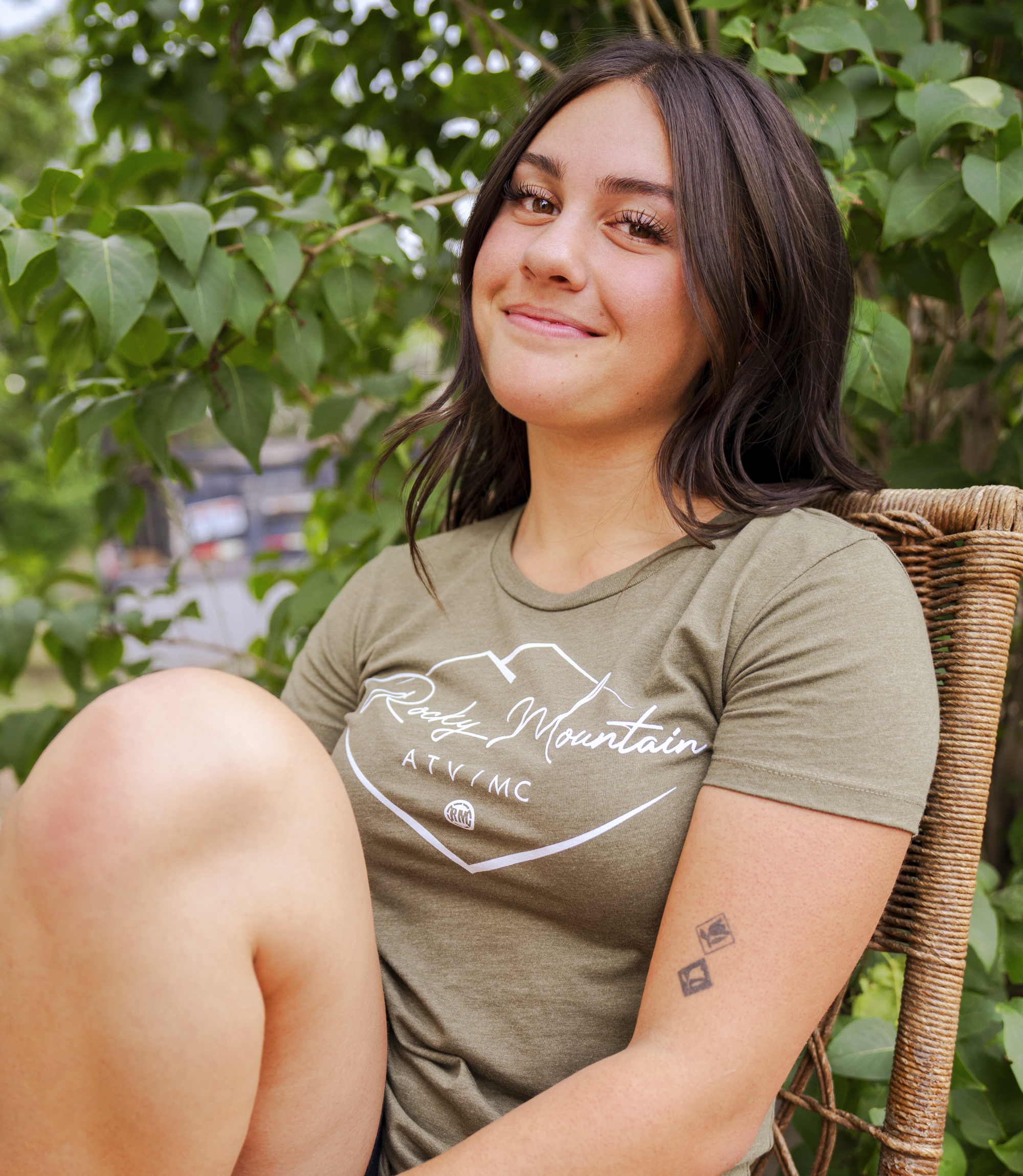 Woman wearing RM shirt.