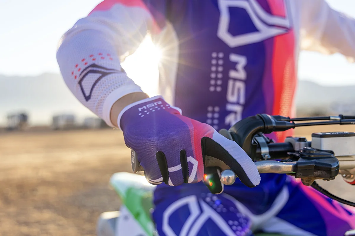 Close-up of rider wearing MSR NXT Air jersey and gloves