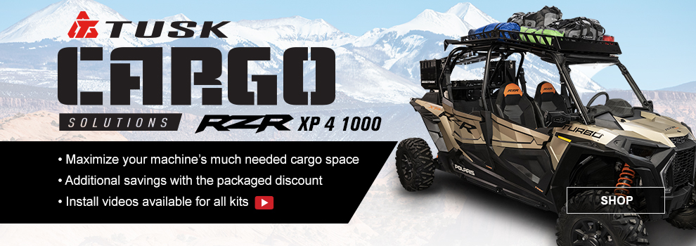 Tusk Cargo Solutions, RZR XP 4 1000, maximize your machines much needed cargo space, additional savings with the packaged discount, install videos available for all kits, a Polaris RZR XP 4 1000 with the Overland Cargo Kit installed and mountains in the background, link, shop