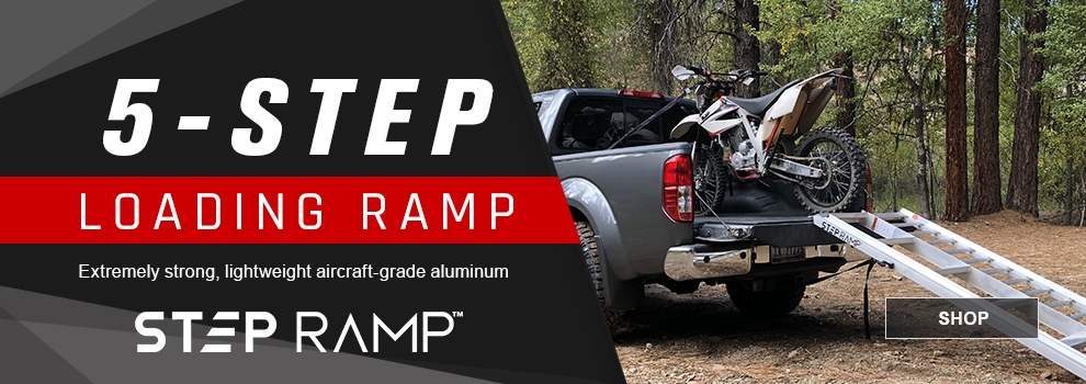 Step Ramp 5-step loading ramp, extremely strong, lightweight aircraft-grade aluminum, the ramp is being used on a truck in the woods, link, shop