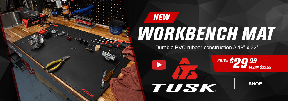 New, Tusk Workbench Mat, Durable PVC rubber construction 18 inches by 32 inches, Price $29 and 99 cents, MSRP $35 and 99 cents, Video, the mat on an bench with a bunch of parts and tools on it, link, shop