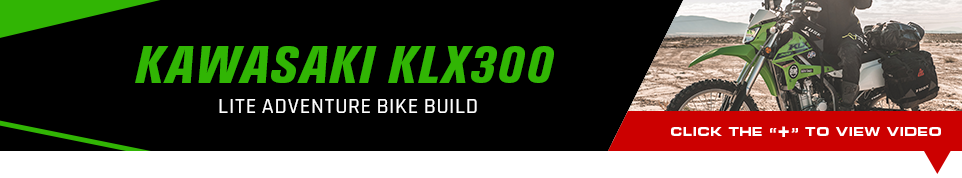 Kawasaki KLX300 Lite Adventure Bike Build, a shot of someone sitting on the fully built bike, Click the plus symbol to view video.